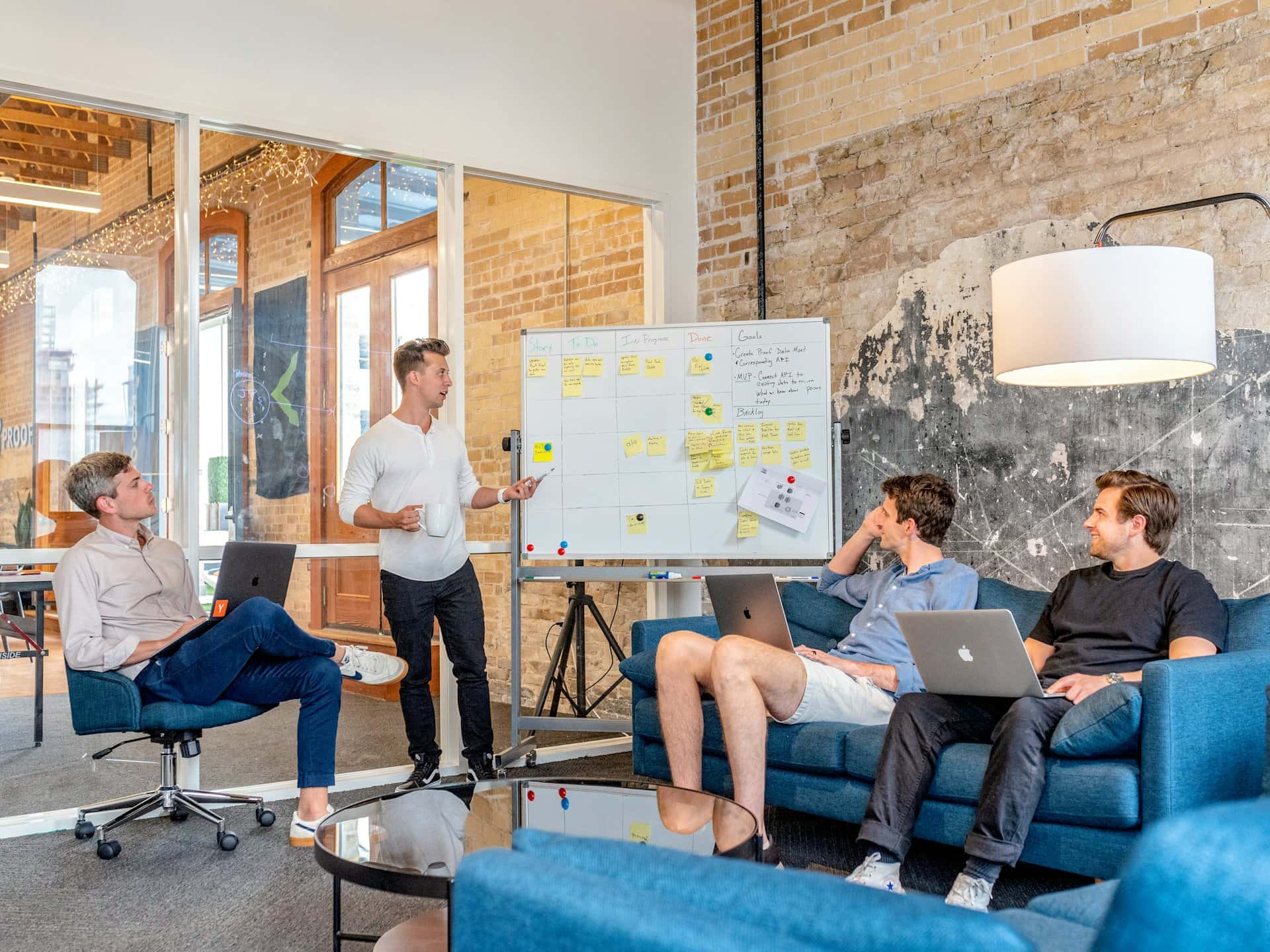 Team training session with a presenter at a whiteboard