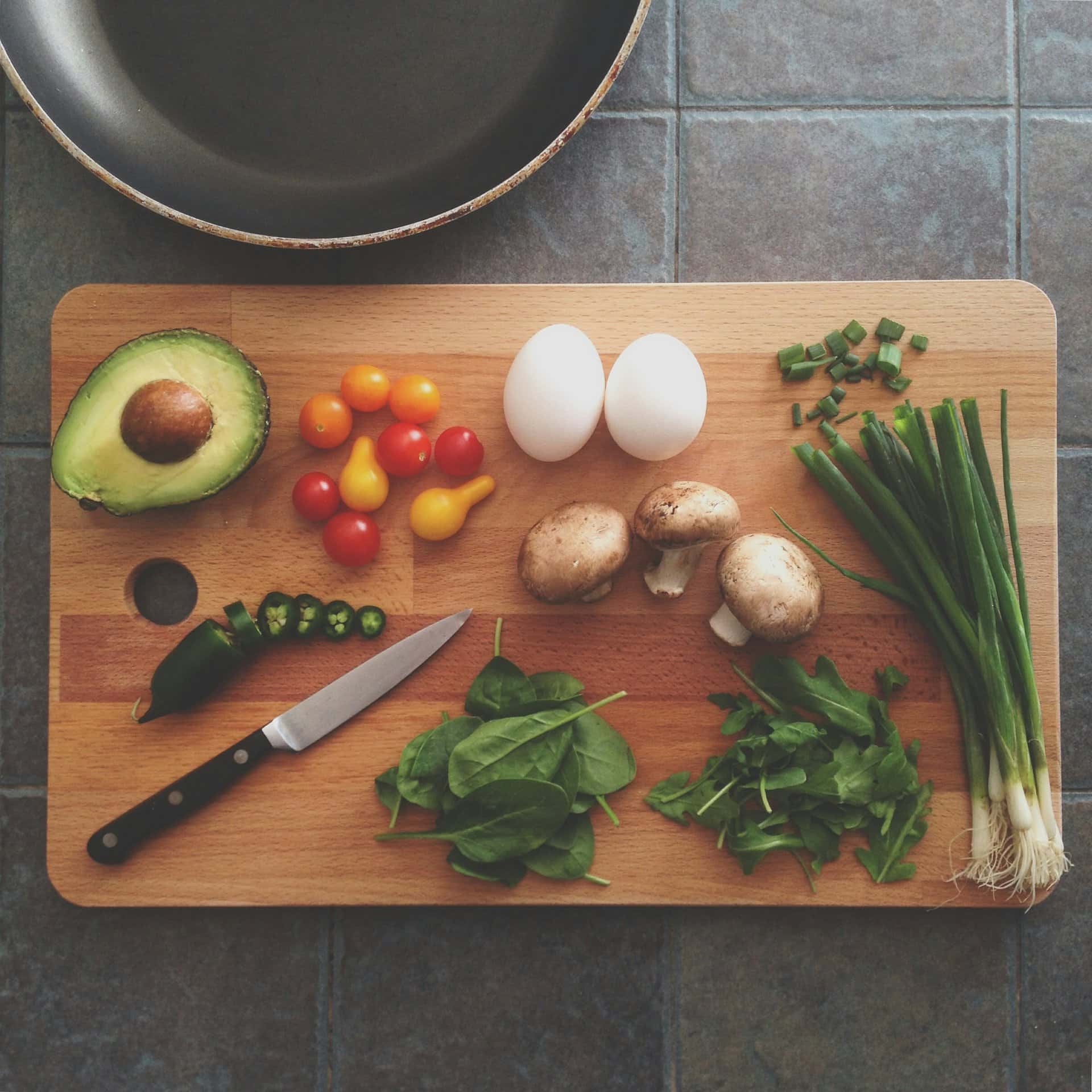 Fresh ingredients on a wooden chopping board